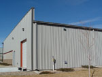 Commercial office and storage buildings with a unique look can ad aesthetics and resale value to your property.  This building features a parapet façade that covers the traditional gable end wall and features the semi-concealed wall panel that enhances the outer appearance.